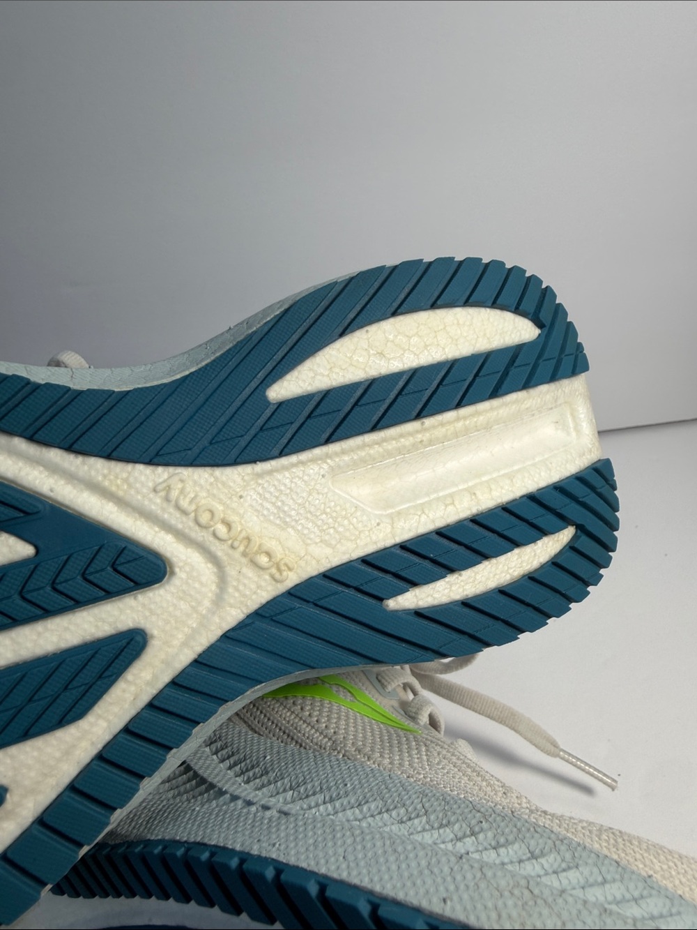Saucony White Running Shoes with Neon Green and Teal Accents - Picture 8 of 9